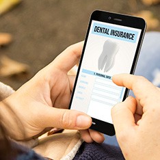 Patient in Columbus checking dental insurance for dental emergencies