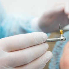 Patient undergoing dental implant surgery